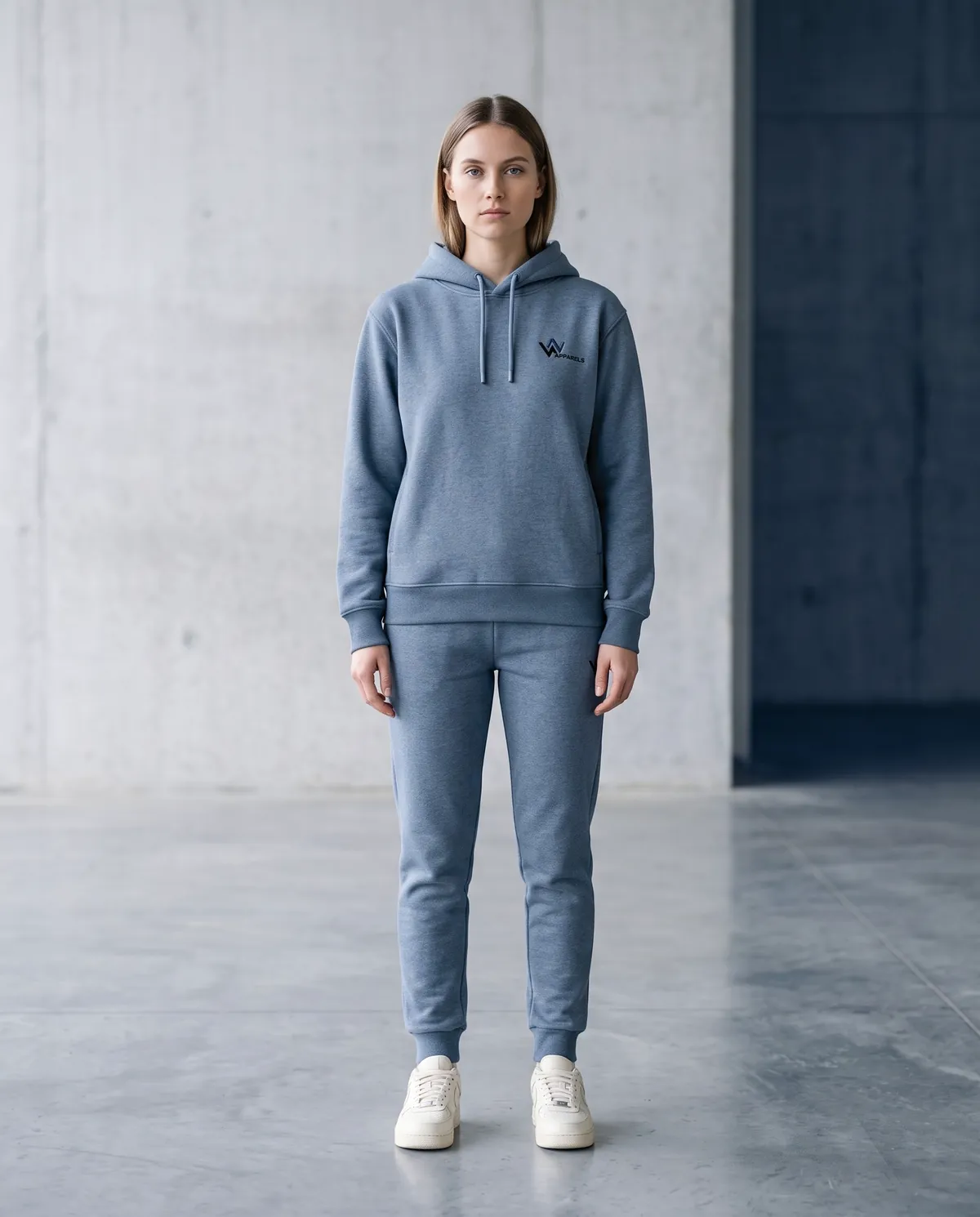 Model in a regular-fit steel-blue hoodie and tapered jogger set