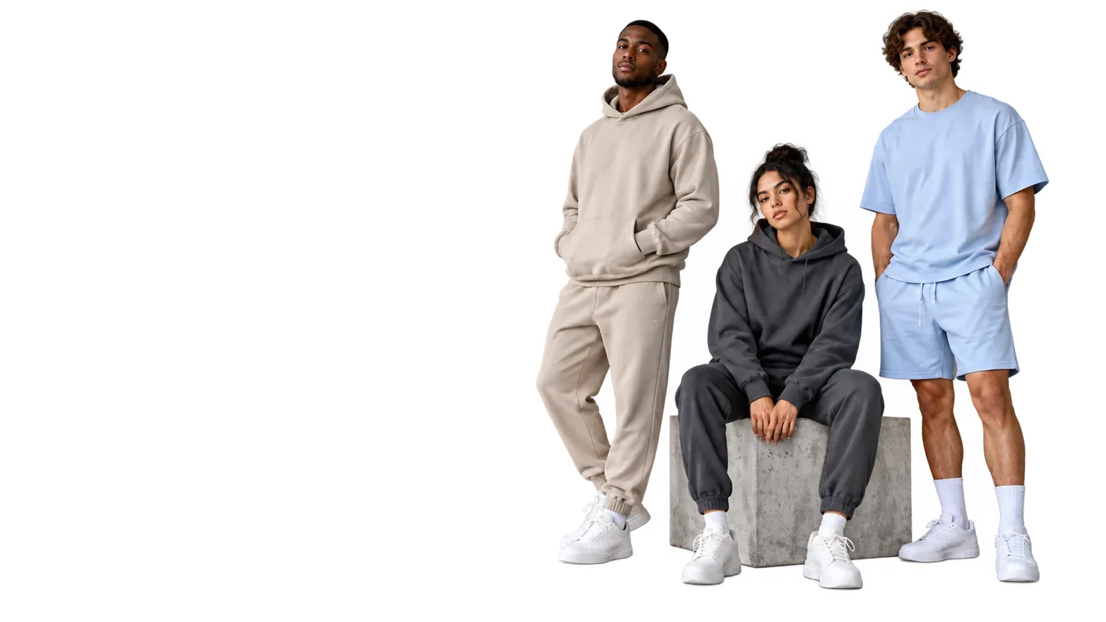 Three models in matching sets: a stone hoodie and joggers, a charcoal hoodie set and a sky tee and shorts